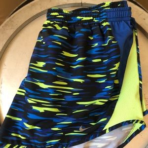 blue, neon green and black camo nike shorts